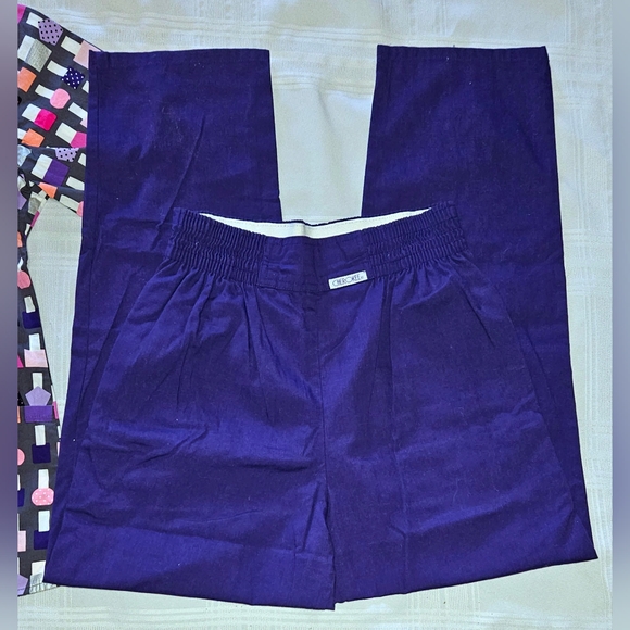 Scrub Set in Small with different colors of Nail Polish & Matching Purple Pants - Picture 3 of 4